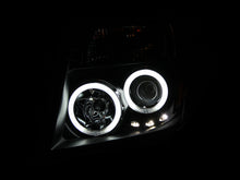 Load image into Gallery viewer, ANZO 2005-2008 Nissan Frontier Projector Headlights w/ Halo Black
