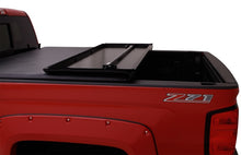 Load image into Gallery viewer, Lund 05-10 Dodge Dakota Fleetside (6.5ft. Bed) Hard Fold Tonneau Cover - Black
