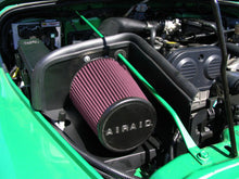 Load image into Gallery viewer, Airaid 03-06 Jeep Wrangler 2.4L CAD Intake System w/ Tube (Oiled / Red Media)
