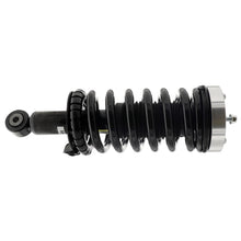Load image into Gallery viewer, KYB Strut Plus Front Truck-Plus Leveling Assembly 04-15 Nissan Titan 2WD
