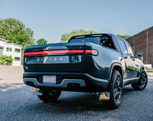 Load image into Gallery viewer, Rally Armor 2022 Rivian R1T Black UR Mud Flap w/ Tangerine Scream Logo
