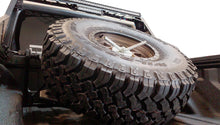 Load image into Gallery viewer, DV8 Offroad 2019+ Jeep Gladiator In-Bed Adjustable Tire Carrier
