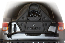 Load image into Gallery viewer, DV8 Offroad 07-18 Jeep Wrangler Body Mounted Tire Carrier
