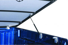 Load image into Gallery viewer, Lund 14-17 Chevy Silverado 1500 (5.5ft. Bed) Genesis Elite Tri-Fold Tonneau Cover - Black
