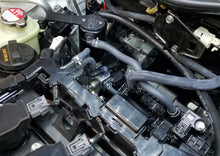 Load image into Gallery viewer, J&amp;L 16-21 Honda Civic 1.5L Turbo (EX &amp; Si) Passenger Side Oil Separator 3.0 - Black Anodized
