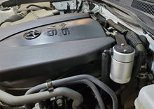 Load image into Gallery viewer, J&amp;L 16-23 Toyota Tacoma 3.5L Driver Side Oil Separator 3.0 - Clear Anodized
