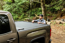 Load image into Gallery viewer, Roll-N-Lock 2020 GM Silverado / Sierra 2500/3500 6ft 10in Bed A-Series Retractable Tonneau Cover
