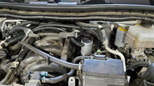 Load image into Gallery viewer, J&amp;L 17-24 Nissan Armada / 14-24 Infiniti QX80 5.6L Driver Side Oil Separator 3.0 - Clear Anodize
