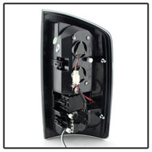Load image into Gallery viewer, Spyder Dodge Ram 07-08 1500/Ram 07-09 2500/3500 LED Tail Lights Black Smoke ALT-YD-DRAM06-LED-BSM
