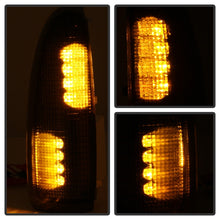 Load image into Gallery viewer, xTune Ford Superduty F250-F650 03-07 Amber LED Mirror Signal Lens - Smoke ACC-LED-FDSD99-MR-SM
