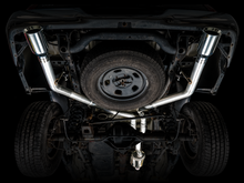 Load image into Gallery viewer, AWE Tuning 09-18 RAM 1500 5.7L (w/Cutouts) 0FG Dual Rear Exit Cat-Back Exhaust - Chrome Silver Tips
