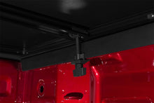 Load image into Gallery viewer, Lund 19-23 RAM 1500 (6.5ft Bed w/o RamBox Cargo Mgmt) Genesis Elite Tri-Fold Tonneau Cover - Black

