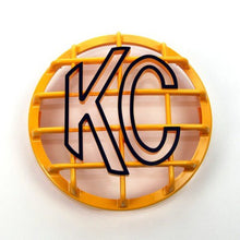 Load image into Gallery viewer, KC HiLiTES 6in. Round ABS Stone Guard for SlimLite/Daylighter Lights (Single) - Yellow/Black KC Logo
