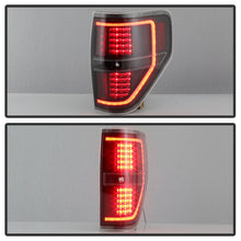 Load image into Gallery viewer, xTune 09-14 Ford F-150 Light Bar LED Tail Lights - Black (ALT-JH-FF15009-LBLED-BK)
