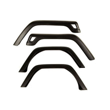 Load image into Gallery viewer, Omix 4-Piece Fender Flare Kit- 97-06 Jeep Wrangler
