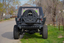 Load image into Gallery viewer, DV8 Offroad 07-18 Jeep Wrangler Body Mounted Tire Carrier

