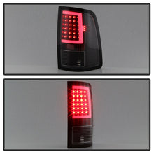 Load image into Gallery viewer, xTune 13-18 Dodge Ram 1500 LED Tail Lights - Black (ALT-ON-DRAM13V2-LBLED-BK)
