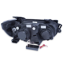 Load image into Gallery viewer, ANZO 2012-2015 Chevrolet Sonic Projector Headlights w/ Halo Black (CCFL)
