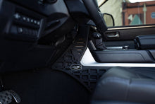 Load image into Gallery viewer, DV8 Offroad 22-23 Toyota Tundra Center Console Molle Panels/Device Mount
