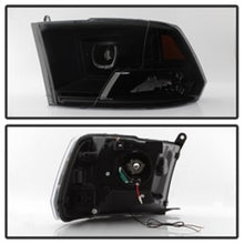 Load image into Gallery viewer, xTune Dodge Ram 2009-2014 Halo LED Projector Headlights - Black Smoke PRO-JH-DR09-CFB-BSM
