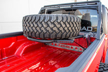 Load image into Gallery viewer, DV8 Offroad 2019+ Jeep Gladiator In-Bed Adjustable Tire Carrier
