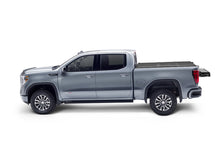 Load image into Gallery viewer, UnderCover 05-21 Nissan Frontier 5ft w/ Factory Cargo Management System Triad Bed Cover
