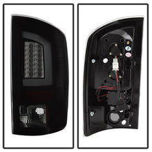 Load image into Gallery viewer, Spyder 07-09 Dodge Ram 2500/3500 V3 Light Bar LED Tail Lights - Blk Smoke ALT-YD-DRAM06V3-LBLED-BSM
