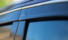 Load image into Gallery viewer, AVS 09-15 Nissan Maxima Ventvisor Low Profile Deflectors 4pc - Smoke w/Chrome Trim
