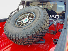 Load image into Gallery viewer, DV8 Offroad 2019+ Jeep Gladiator In-Bed Adjustable Tire Carrier
