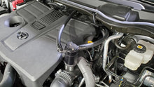 Load image into Gallery viewer, J&amp;L 2022-2024 Toyota Tundra 3.5L Turbo Oil Separator 3.0 Driver Side - Black Anodized
