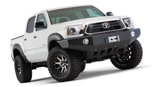 Load image into Gallery viewer, Bushwacker 12-15 Toyota Tacoma Fleetside Pocket Style Flares 4pc 60.3in Bed - Black
