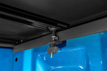 Load image into Gallery viewer, Lund 21+ Ford F-150 (5.5ft. Bed) Genesis Tri-Fold Tonneau Cover - Black
