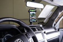 Load image into Gallery viewer, DV8 Offroad 10-23 Toyota 4Runner Digital Device Dash Mount
