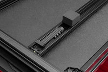 Load image into Gallery viewer, Lund 15-17 Chevy Colorado Fleetside (5ft. Bed) Hard Fold Tonneau Cover - Black
