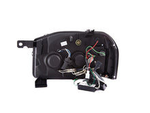 Load image into Gallery viewer, ANZO 2001-2004 Nissan Frontier Projector Headlights w/ Halo Black (CCFL)
