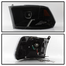 Load image into Gallery viewer, xTune Dodge Ram 2009-2014 Halo LED Projector Headlights - Black Smoke PRO-JH-DR09-CFB-BSM
