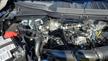 Load image into Gallery viewer, J&amp;L 2011-2023 Ford F-150 2.7L/3.5L/5.0L Passenger Side Oil Separator 3.0 - Black Anodized
