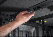 Load image into Gallery viewer, Extang 05-21 Nissan Frontier w/Factory Side Bed Rail Caps (5ft. Bed) Solid Fold ALX
