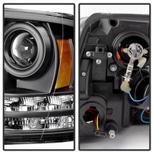 Load image into Gallery viewer, Spyder Dodge Ram 09-12 Projector Headlights Light Bar DRL Black PRO-YD-DR09-LBDRL-BK
