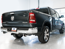 Load image into Gallery viewer, AWE Tuning 19-21 RAM 1500 5.7L (w/Cutouts) 0FG Dual Rear Exit Cat-Back Exhaust - Chrome Silver Tips
