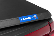 Load image into Gallery viewer, Lund 19-23 RAM 1500 (5.5ft Bed w/o RamBox Cargo Mgmt) Genesis Elite Tri-Fold Tonneau Cover - Black
