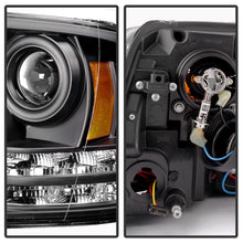 Load image into Gallery viewer, Spyder Dodge Ram 09-12 Projector Headlights Light Bar DRL Black PRO-YD-DR09-LBDRL-BK
