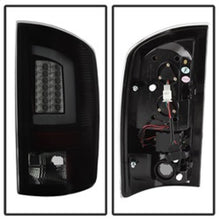 Load image into Gallery viewer, Spyder 07-09 Dodge Ram 2500/3500 V3 Light Bar LED Tail Lights - Blk Smoke ALT-YD-DRAM06V3-LBLED-BSM
