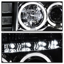 Load image into Gallery viewer, Spyder Nissan Titan 04-14/Armada 04-07 Projector Headlights LED Halo LED Chrm PRO-YD-NTI04-HL-C
